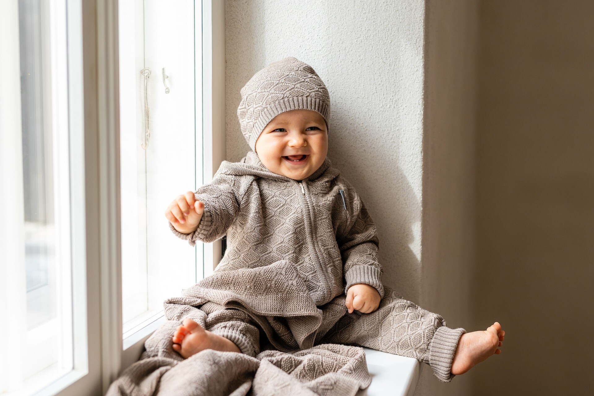 This high-quality merino wool jumpsuit is designed to be all-day comfort from sleeping to playing.