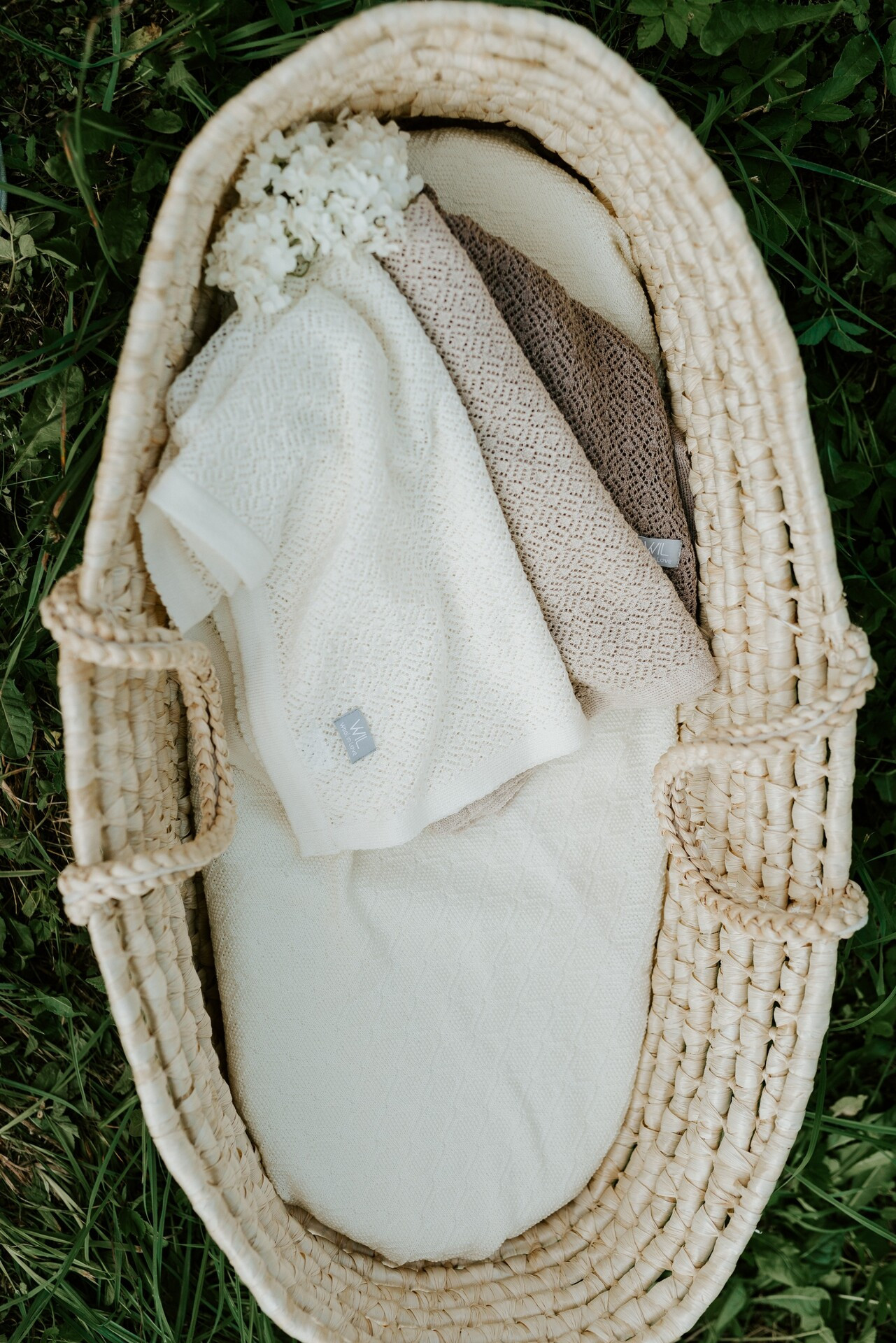 Merino wool knitted baby blanket and bonnet gift set for newborns. 