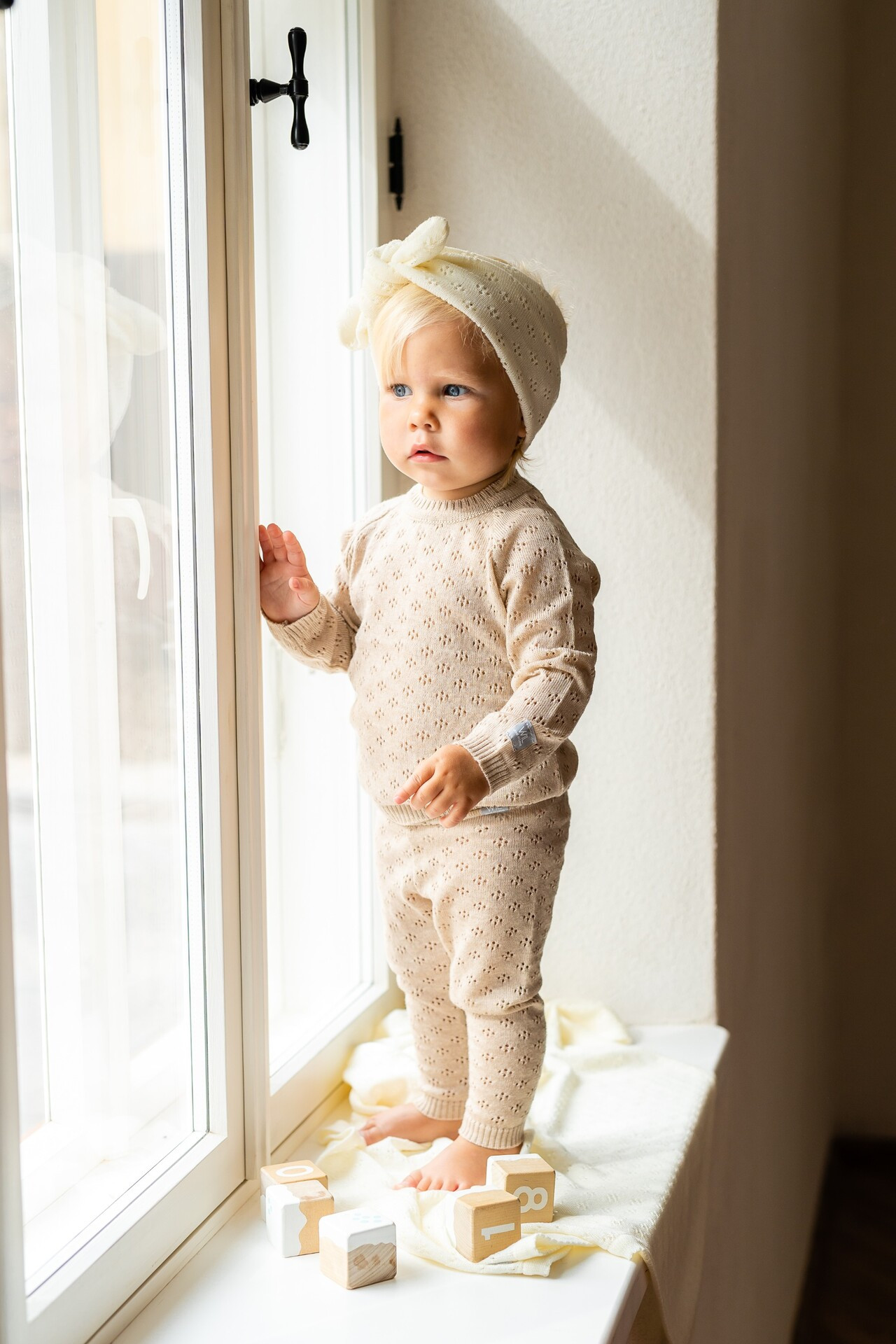 Light and lacy LOVE pattern sweater for babies and little girls. In this lovely sweater your baby is warm but also stylish.