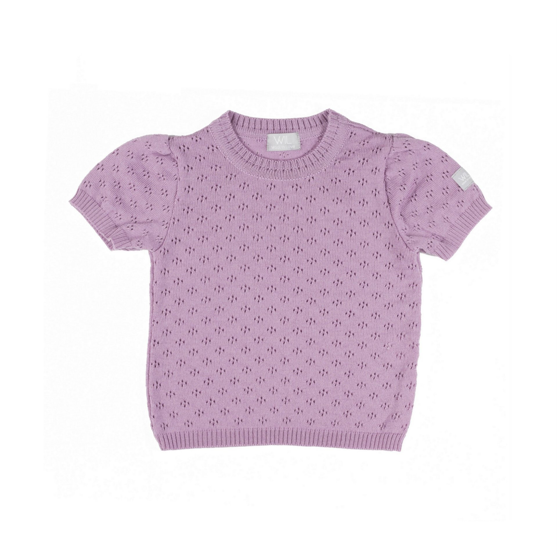 The light and cute sweater. The floral pattern is light, thin and airy.  Small sleeves are slightly puffy to add cuteness. 